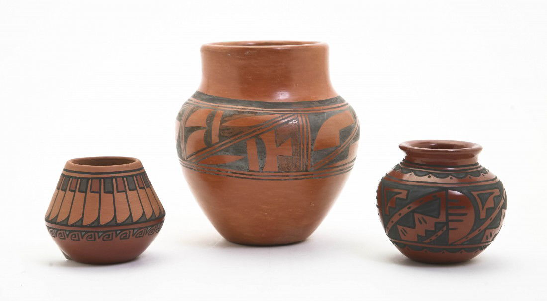 Two Santa Clara Redware Vases, Minnie, Height of t: Two Santa Clara Redware Vases, Minnie, one decorated with stylized feathers, the other with repeating geometric decoration, together with a baluster form vase with repeating geometric decoration signe