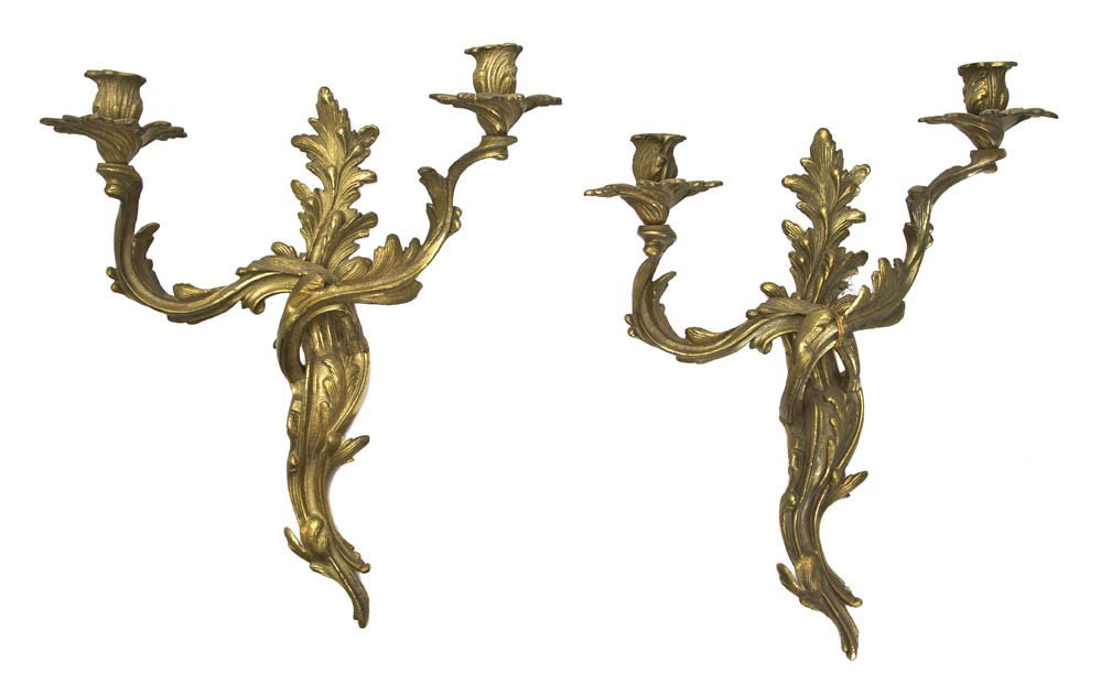 A Pair of Louis XV Style Gilt Bronze Two-Light Scon: A Pair of Louis XV Style Gilt Bronze Two-Light Sconces, each having a foliate cast backplate and candle arms. Height 18 inches.