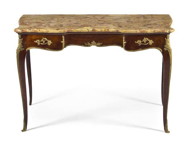 A Louis XVI Style Gilt Metal Mounted Dressing Table: A Louis XVI Style Gilt Metal Mounted Dressing Table, Sormani, having a shaped marble top over the conforming frame set with a single drawer, raised on cabriole legs ending in sabots. Height 30 x width