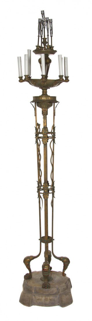 A Neoclassical Gilt Bronze Torchiere, Height 92 in: A Neoclassical Gilt Bronze Torchiere, having thirteen lighting elements over the pan form body raised on four monoped supports with leaf and snake decoration. Height 92 inches.
