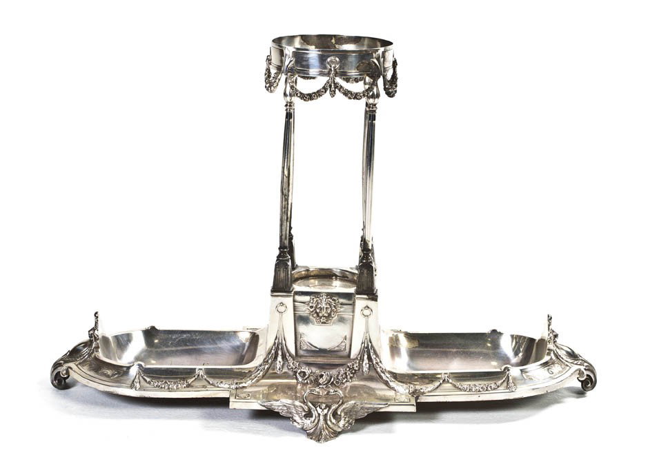 A Neoclassical Silverplate Epergne Base, Height 17: A Neoclassical Silverplate Epergne Base, of oval form with four columnar supports. Height 17 inches.