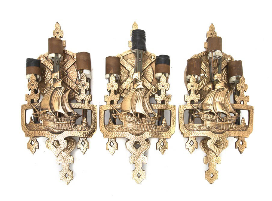 A Set of Three American Bronzed Sconces, Handel, H: A Set of Three American Bronzed Sconces, Handel, each having three-lights and depicting a sailing vessel commemorating Columbus' voyage to America. Height 15 inches.
