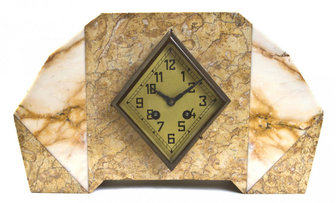 A French Art Deco Marble Mantel Clock, Height 8 3/: A French Art Deco Marble Mantel Clock, executed in multi-colored marble sections, having a diamond form dial with Arabic numerals, raised on a bracket base. Height 8 3/4 x width 14 1/4 x depth 4 inche