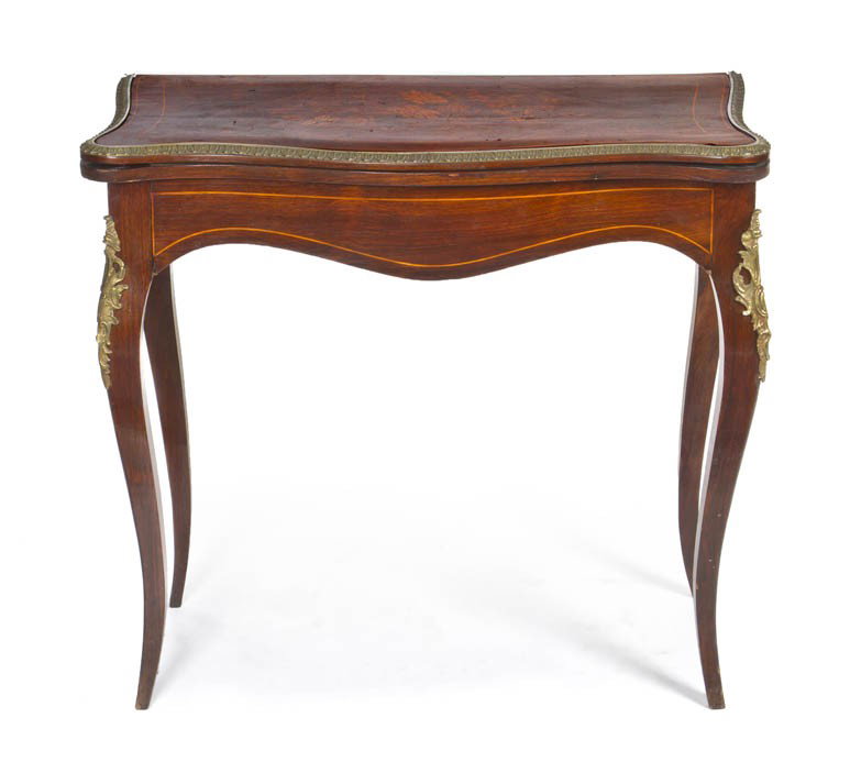 A Continental Gilt Metal Mounted Marquetry Games : A Continental Gilt Metal Mounted Marquetry Games Table, having a shaped rectangular top opening to a felt lined playing surface, raised on square cabriole legs. Height 29 x width 32 1/2 x depth 16 inc