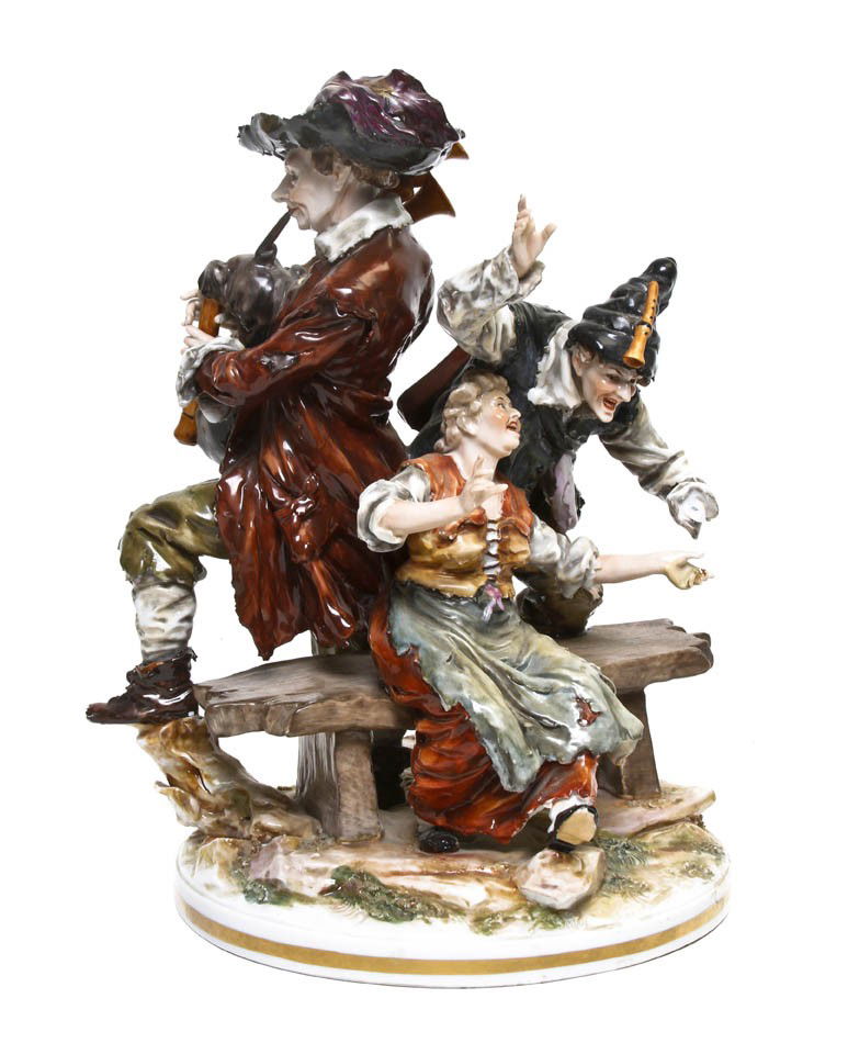 A Capodimonte Porcelain Figural Group, Height 12: A Capodimonte Porcelain Figural Group, depicting three vagrant musicians having crowned N mark. Height 12 inches.