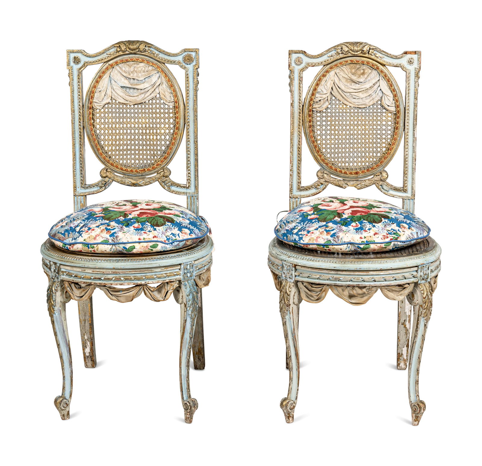 A Pair of Louis XVI Style Painted and Parcel-Gilt Chaises: A Pair of Louis XVI Style Painted and Parcel-Gilt Chaises 19th Century Height 36 inches. This lot is located in Palm Beach.