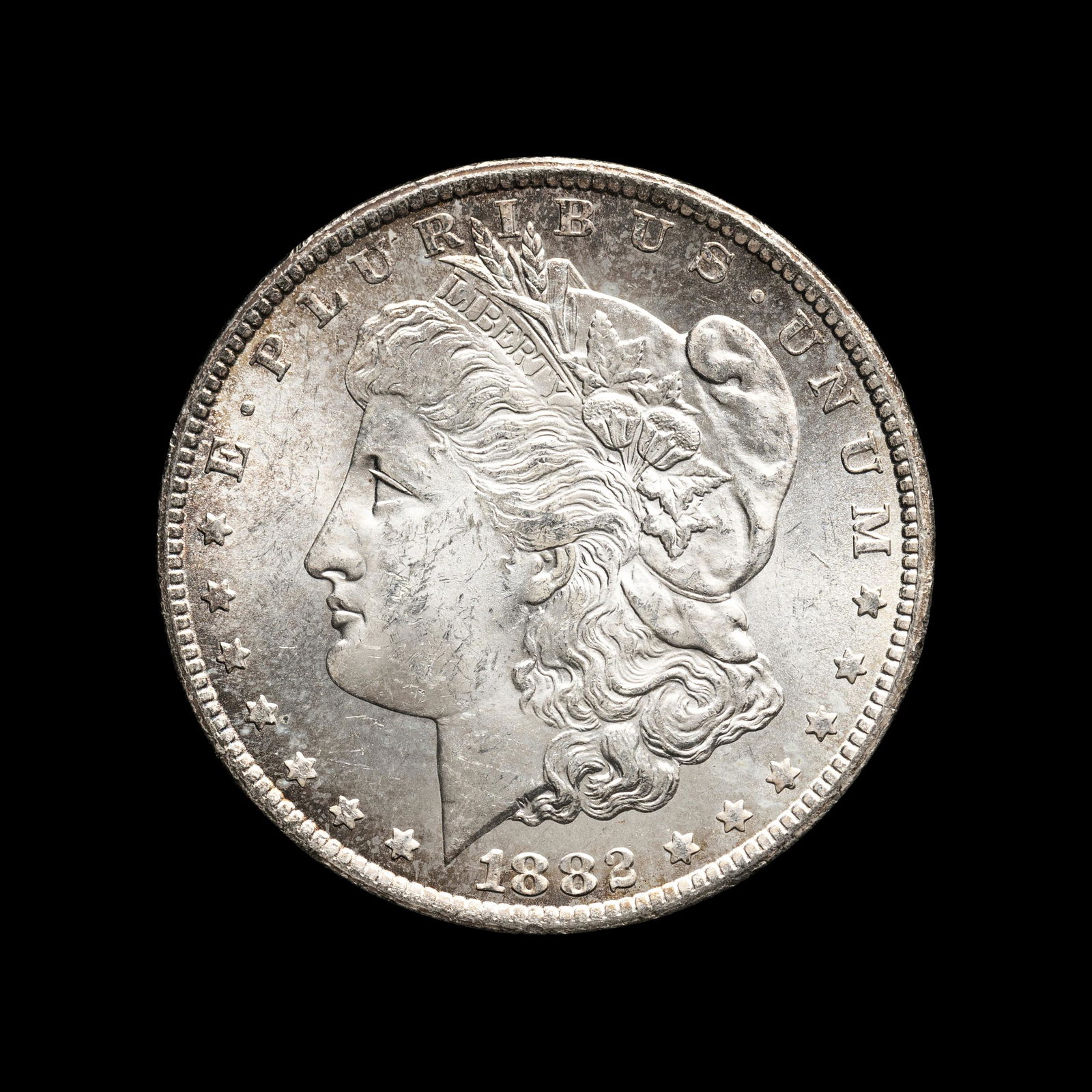 An 1882-CC Morgan $1 Coin (1 of 2)