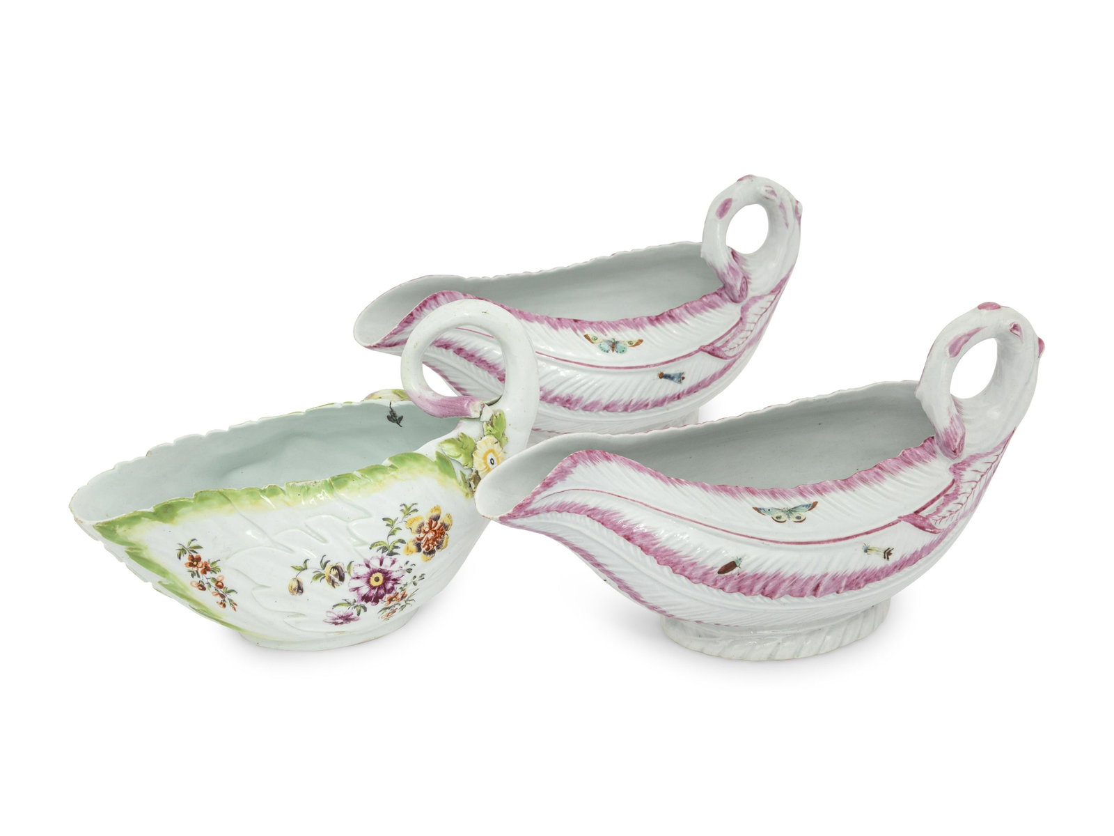 A Pair of French Porcelain Sauce Boats: A Pair of French Porcelain Sauce Boats 19th Century together with another sauce boat. Height 4 1/2 x width 9 1/2 inches. This lot is located in Chicago. Property from the Pamela K. Hull Trust, Chicago
