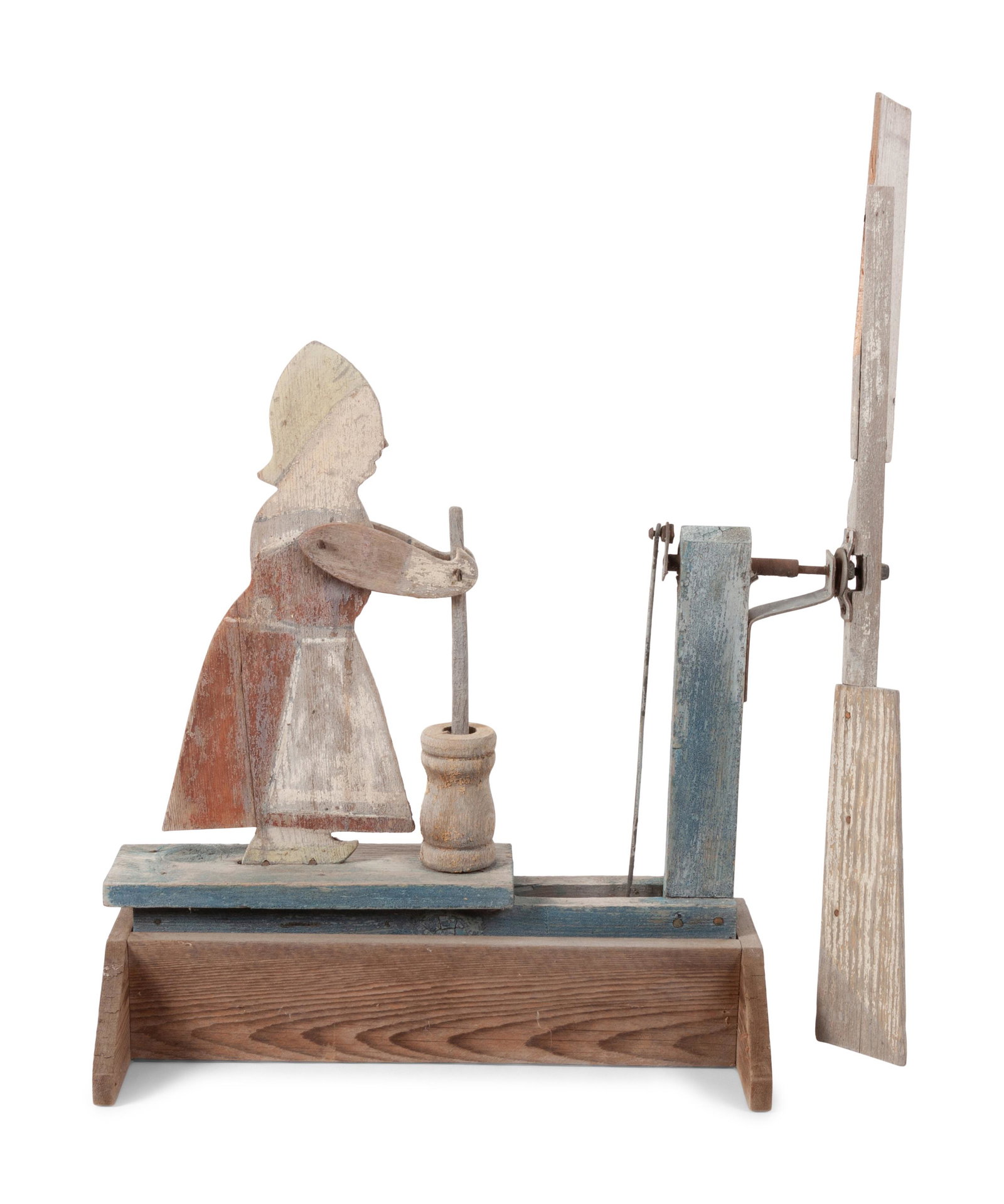 A Folk Art Carved and Painted Wood Butter Churn Whirligig: A Folk Art Carved and Painted Wood Butter Churn Whirligig 20th Century Height 20 1/2 inches. This lot is located in Denver. Property from the Collection of Mrs. Joan Worrall