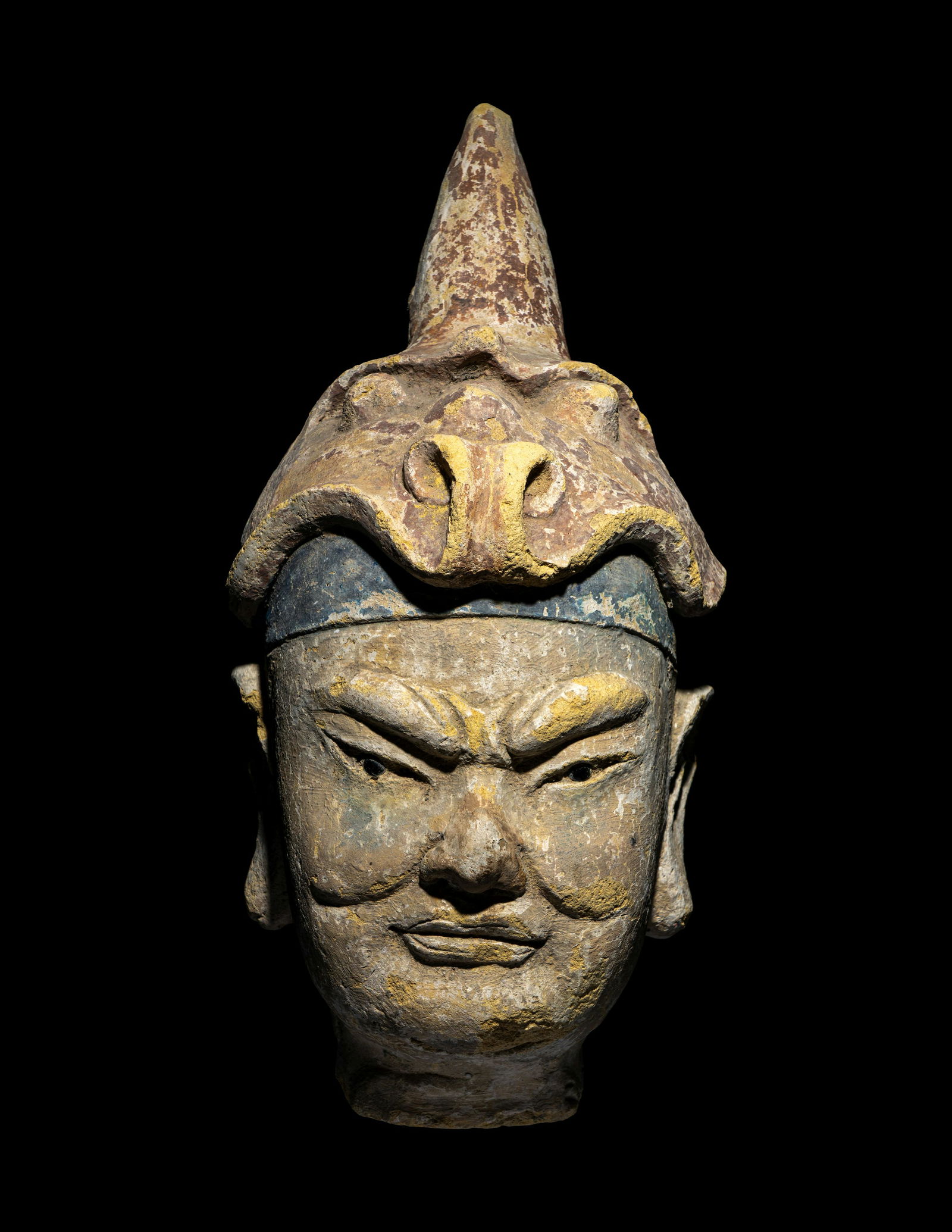 A Polychrome Stucco Head of a Temple Guardian (1 of 3)