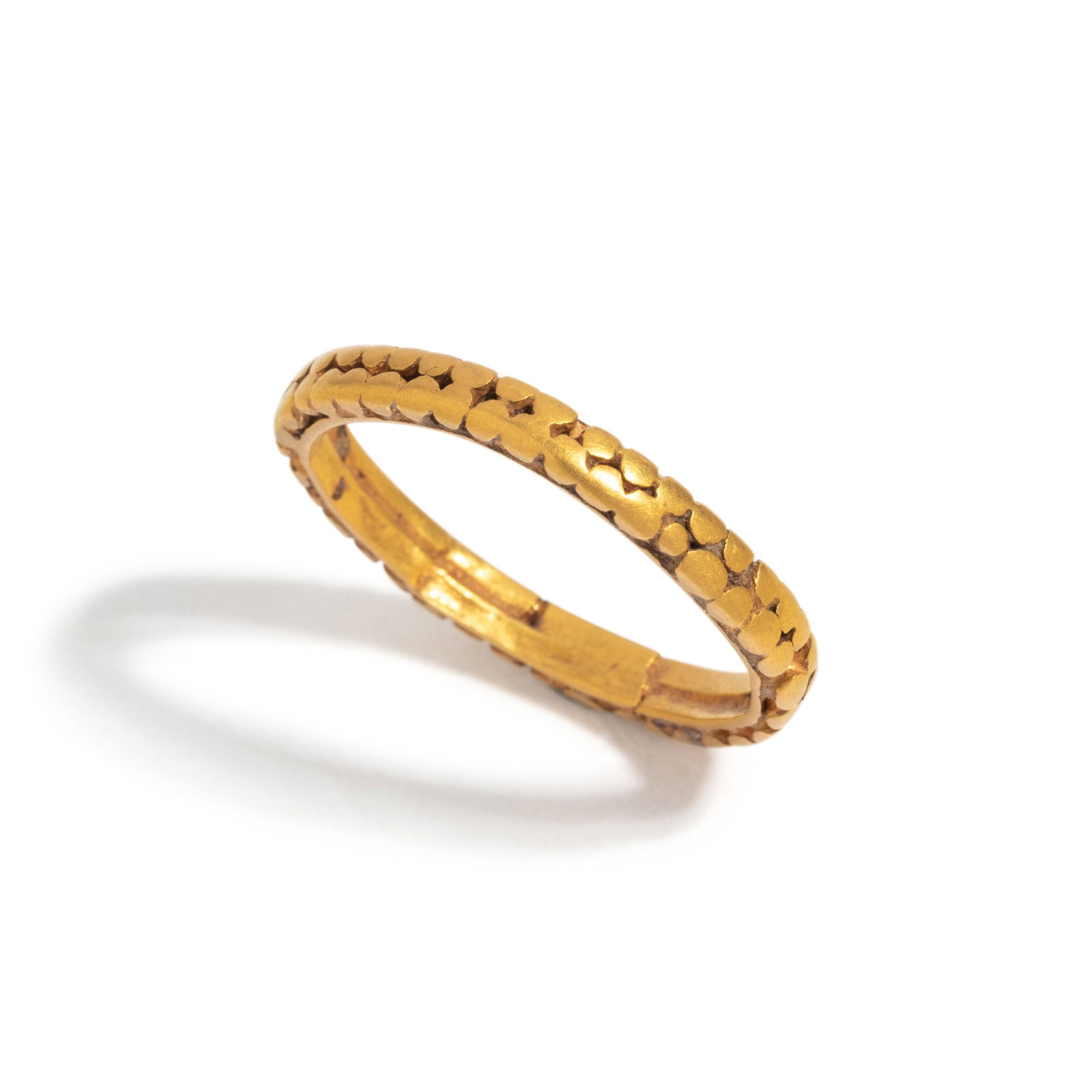 A Byzantine Gold Textured Finger Ring: A Byzantine Gold Textured Finger Ring Circa 7th Century A.D. Ring size 6 3/4; 2.4 dwt. Provenance: Private Collection, New Jersey, 1990s.