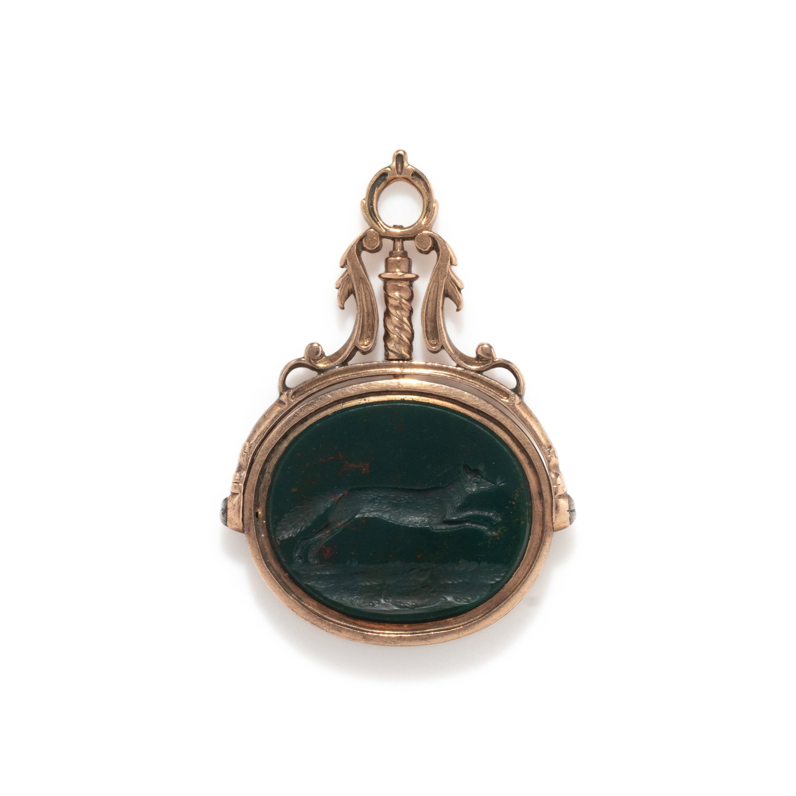 A Victorian Silver and Bloodstone Intaglio Stamp with a Fox: A Victorian Silver and Bloodstone Intaglio Stamp with a Fox Length 1 7/6 inches (4.8 cm); 6 dwt. This lot is located in Chicago.