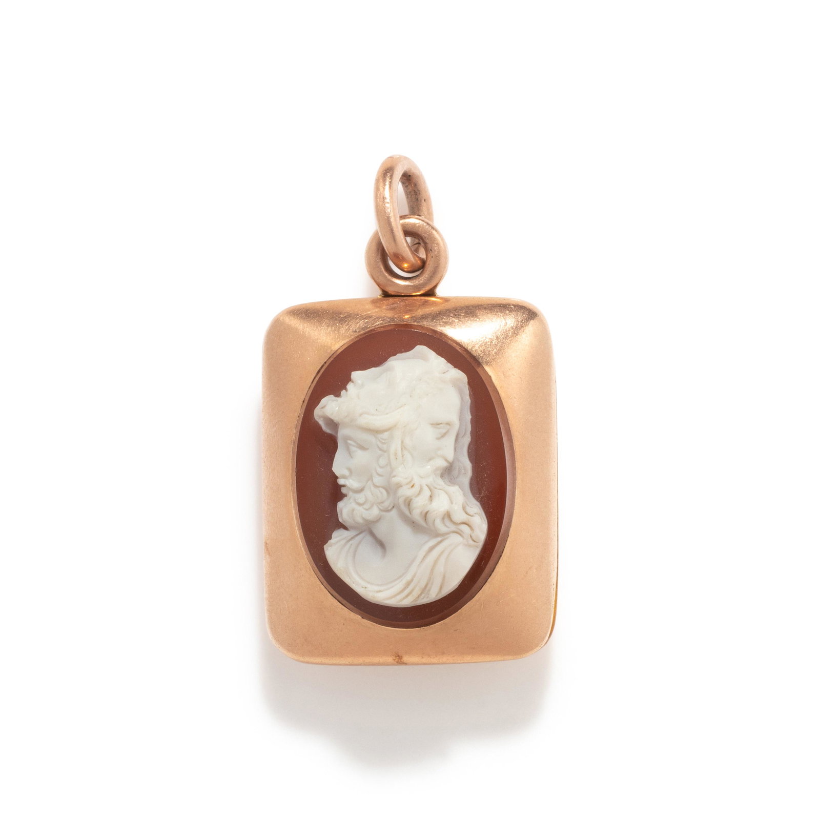 A Red Agate Cameo Locket Pendant: A Red Agate Cameo Locket Pendant Length 1 1/2 inches (4 cm); Length of cameo 7/8 inch (2.2 cm); 9.7 dwt. This lot is located in Chicago.
