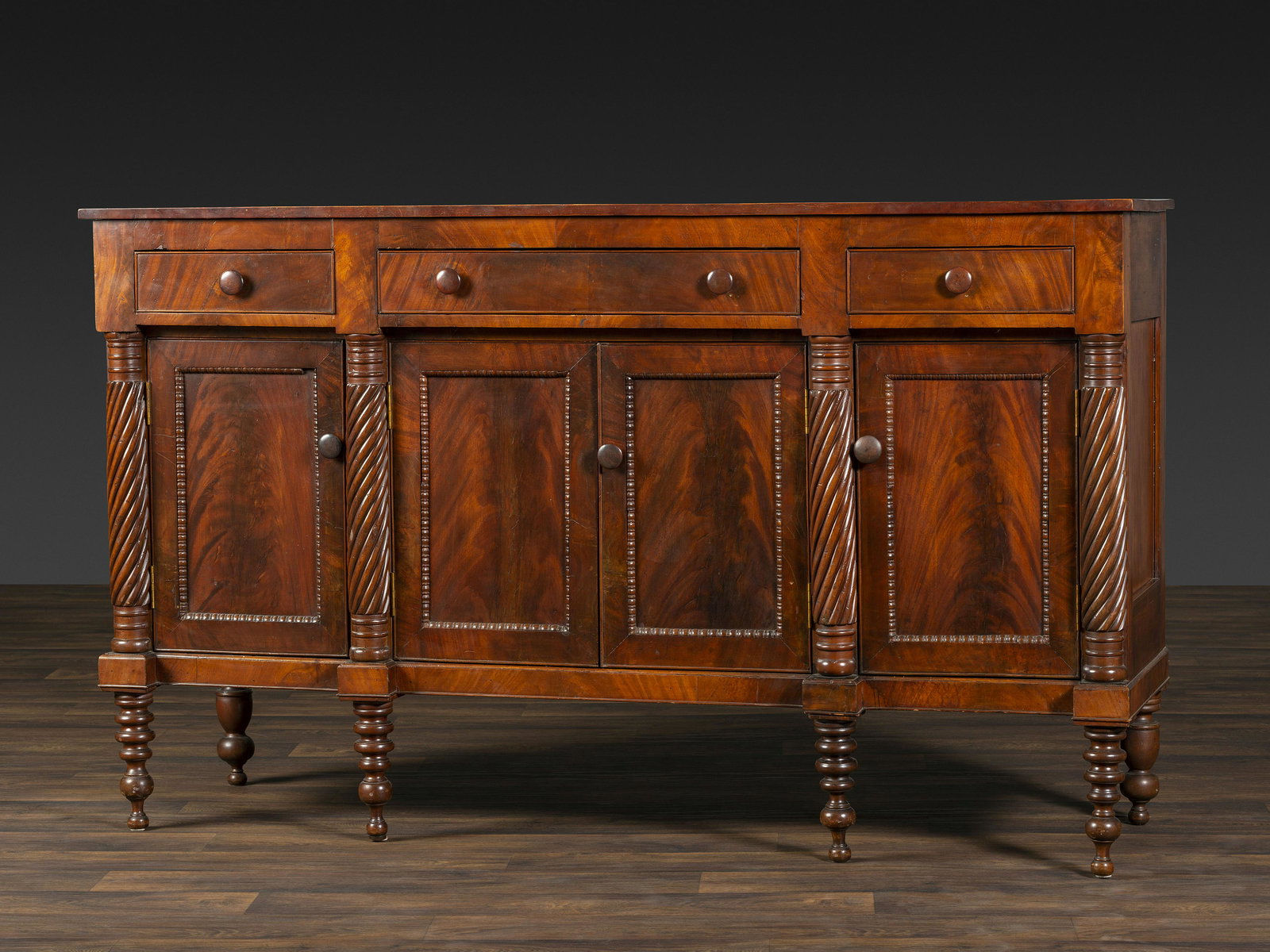 An American Empire Carved and Highly Figured Mahogany and Cherrywood Sideboard (1 of 4)