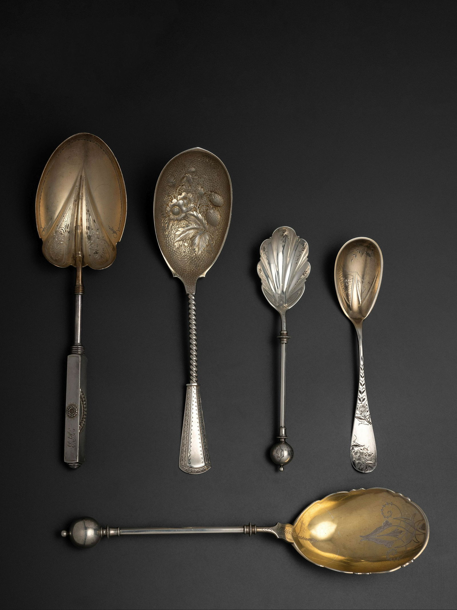 Five American Silver Serving Spoons: Five American Silver Serving Spoons Second Half 19th Century comprising a Gorham 'Japanese' serving spoon, two George Sharp spoons, a C.W. Wilcox engraved spoon and a berry spoon. each marked Sterling
