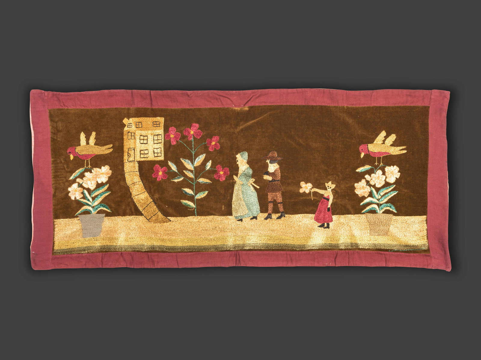 An American Embroidery on Velvet: An American Embroidery on Velvet Last Quarter 19th Century in silk and metallic thread, depicting a family in colonial dress. 24 1/2 x 57 1/2 inches. This lot is located in Cincinnati. Property from t