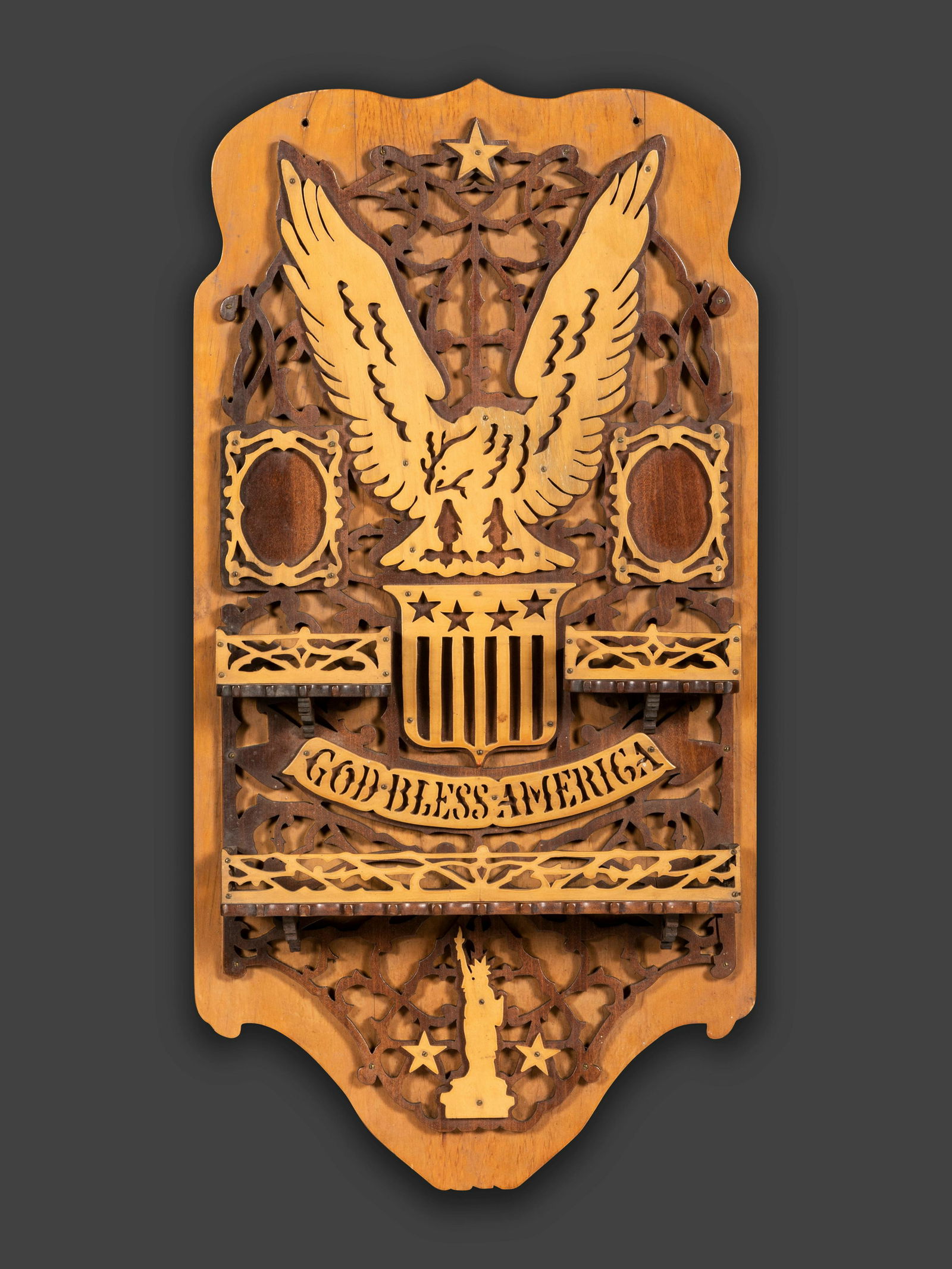 A Patriotic Fretwork Carved Wall Shelf and Frame (1 of 2)