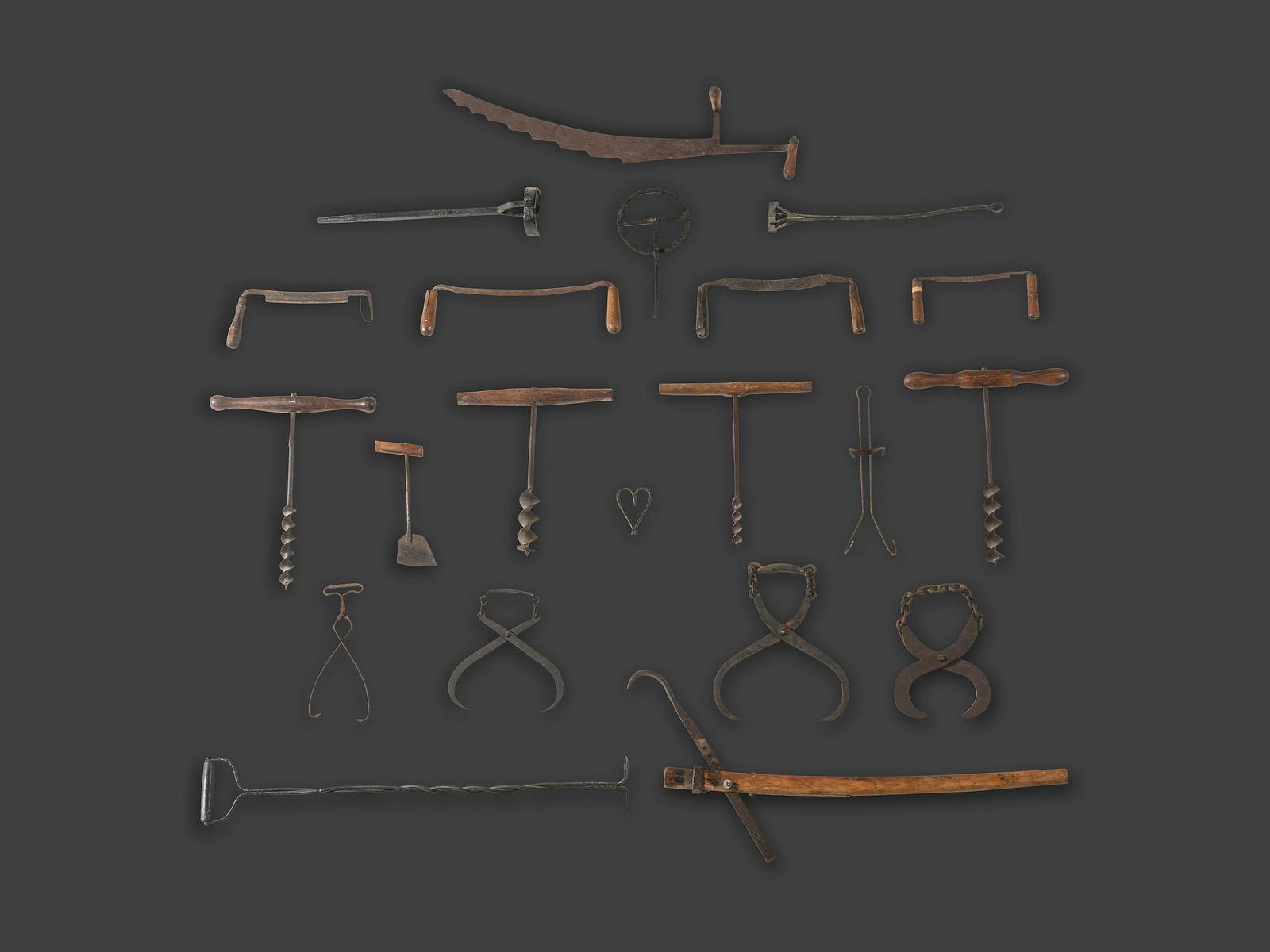 A Group of Early Cast Iron and Wood Farm and Carpentry Tools (1 of 3)