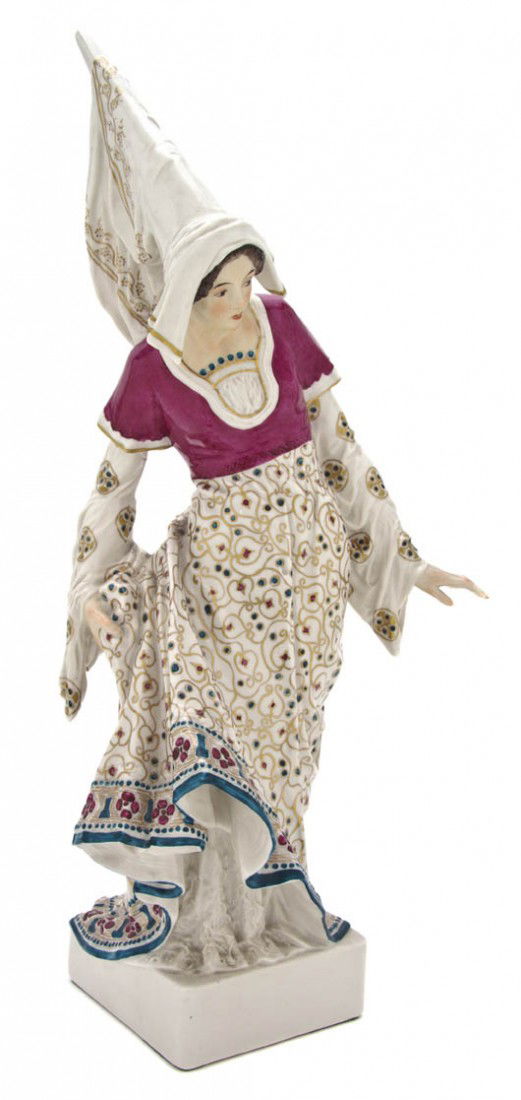 A German Porcelain Figure of a Girl, Royal Schwarz: A German Porcelain Figure of a Girl, Royal Schwarzburg, depicted in a long dress having repetitive geometric gilt decoration, raised on a square base. Height 18 inches.