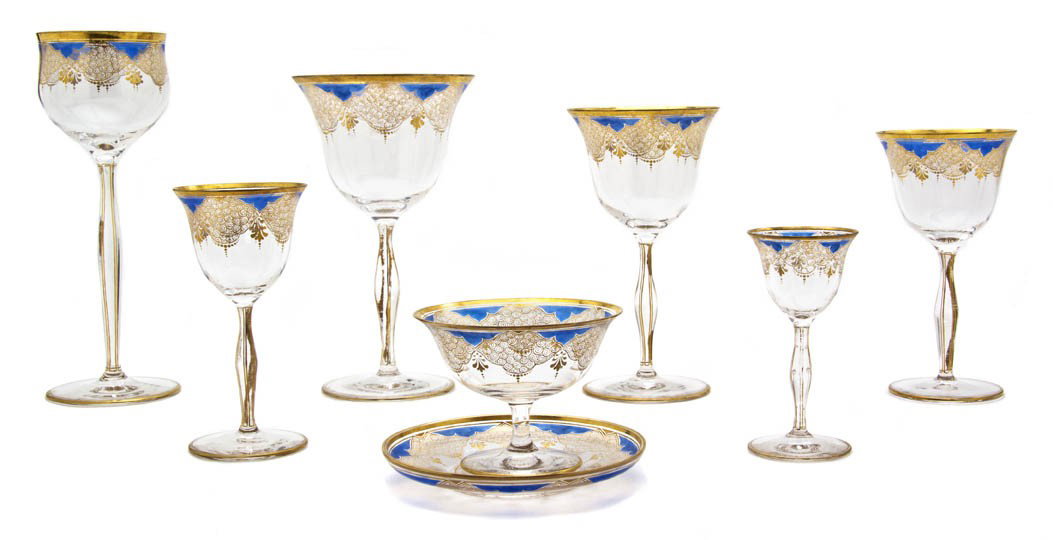 A Gilt and Enameled Glass Partial Stemware Service: A Gilt and Enameled Glass Partial Stemware Service, comprising 9 cordials, 15 sorbets, 10 champagnes, 11 liquors, 12 white wines, 14 red wines, 8 waters and 13 long stemmed glasses, together with 16 u