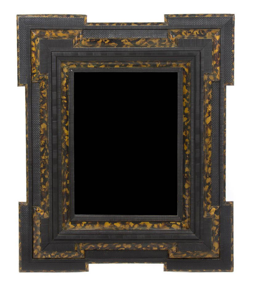A Continental Ebonized and Faux Tortoise Shell Ven: A Continental Ebonized and Faux Tortoise Shell Veneered Mirror, of rectangular form. Height 40 1/2 inches. Property from the Estate of Marjorie I. Mitchell, Chicago, Illinois