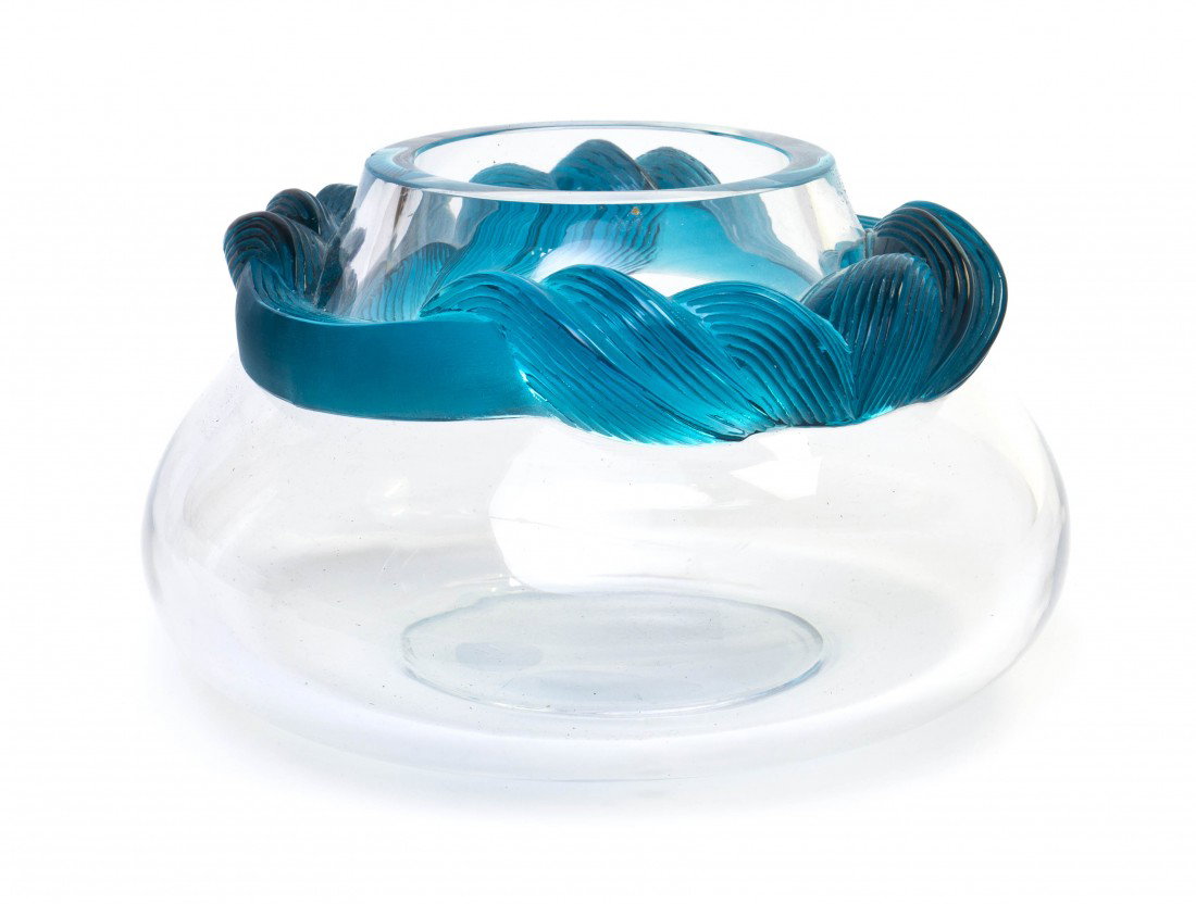 A Lalique Molded and Frosted Glass Cyrus Center Bo: A Lalique Molded and Frosted Glass Cyrus Center Bowl, of bulbous form having an applied entwined blue glass accent, etched Lalique France. Diameter 10 1/4 inches. Property from the Collection of Ernie
