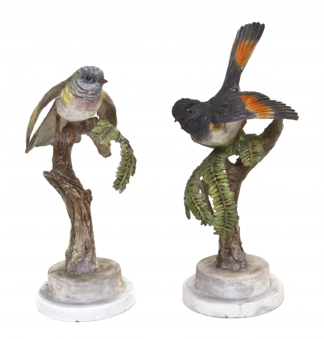 A Pair of Royal Worcester Dorothy Doughty Birds, A: A Pair of Royal Worcester Dorothy Doughty Birds, American Redstarts, perched on hemlock branches. Height of taller 9 1/4 inches.