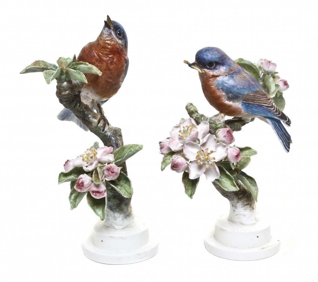 A Pair of Royal Worcester Dorothy Doughty Birds, B: A Pair of Royal Worcester Dorothy Doughty Birds, Bluebirds, perched on apple blossoms. Height 9 inches.