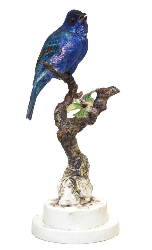 A Royal Worcester Dorothy Doughty Bird, Indigo Bun: A Royal Worcester Dorothy Doughty Bird, Indigo Bunting, perched on a plum twig. Height 9 inches.