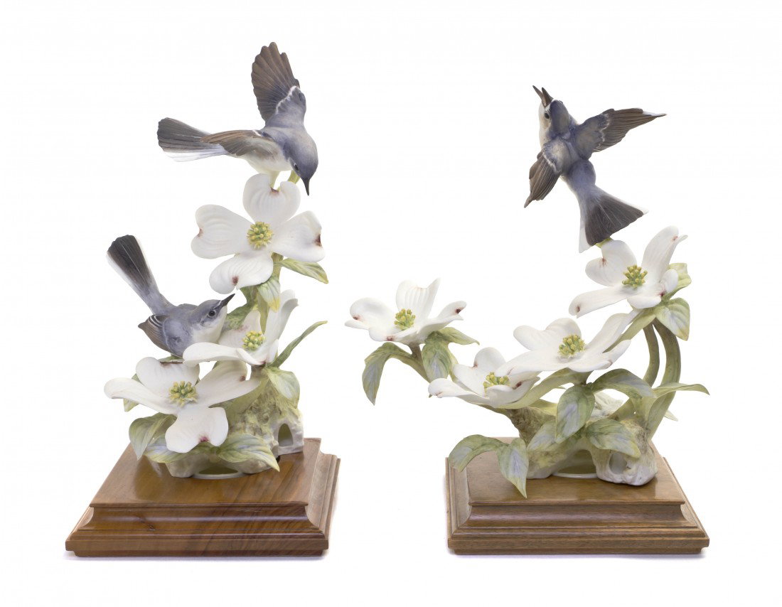 A Pair of Royal Worcester Dorothy Doughty Birds, B: A Pair of Royal Worcester Dorothy Doughty Birds, Blue-Grey Gnatcatchers, on in flight, two others perched on dogwood. Height 11 1/2 inches.