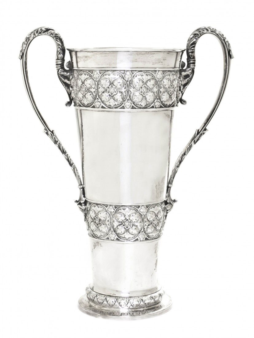 An English Silver Vase, Horace Woodward & Co. (Edg: An English Silver Vase, Horace Woodward & Co. (Edgar Finley & Hugh Taylor), London, 1891, of tapering form, having acanthus leaf decorated open ear-form handles, with floral repousse decoration in thr
