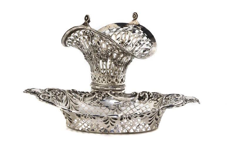 An English Silver Pierced Bonbon Dish, George Nath: An English Silver Pierced Bonbon Dish, George Nathan & Ridley Hayes, Exeter, 1906, together with a Continental silver pierced basket, the basket lacking swing handle; approximate total weight 6.54 ozt