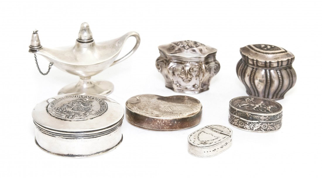 A Collection of Diminutive Silver and Silverplate: A Collection of Diminutive Silver and Silverplate Articles, comprising a German silver cigar oil lamp, and Italian silver snuff box, three continental snuff boxes, a circular box set with a silver coi