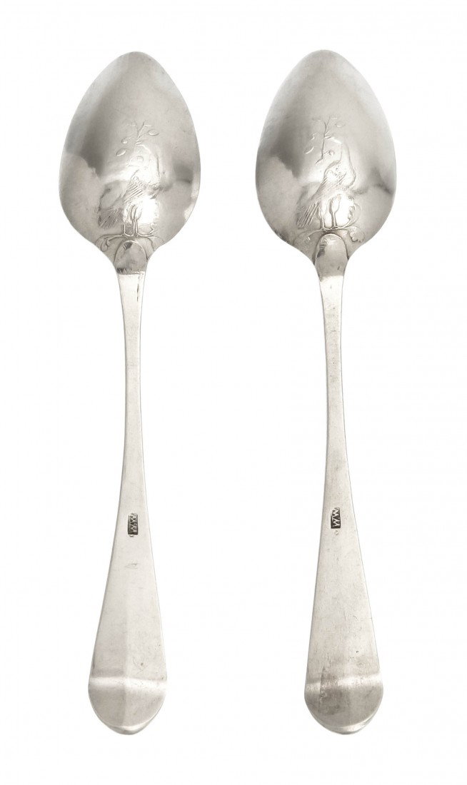 A Pair of American Coin Silver Spoons, Length 5 i: A Pair of American Coin Silver Spoons, each bowl decorated with a bird holding an olive branch in its beak, the handles monogrammed M+G, bearing maker's mark W.W.; approximate total weight 0.65 ozt. L