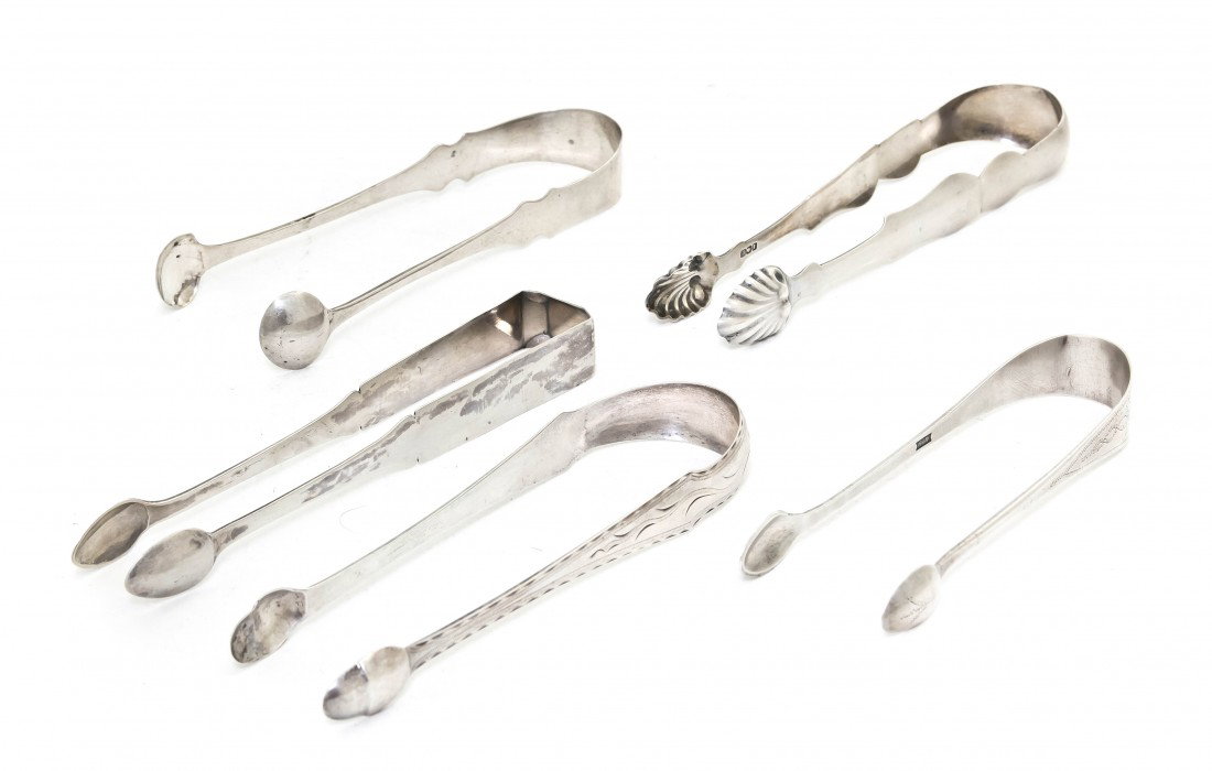 Five American Coin Silver Sugar Tongs, Length of : Five American Coin Silver Sugar Tongs, of various forms and sizes, comprising one stamped Waterman, one stamped Booth and three others unmarked; approximate total weight 5.56 ozt. Length of longest 6 