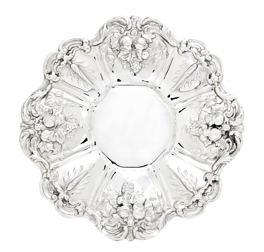 An American Sterling Silver Charger, Reed & Barto: An American Sterling Silver Charger, Reed & Barton, in the Francis I pattern of lobed form with foliate and fruit repousse decoration, number X569; approximate weight 17.55 ozt. Diameter 11 1/4 inches