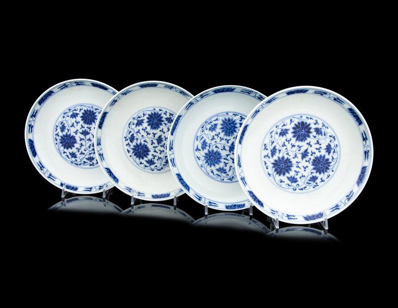 Four Chinese Blue and White Porcelain 'Lotus' Plates : Four Chinese Blue and White Porcelain 'Lotus' Plates decorated on both sides with lotus scrolls. Diameter 7 3/8 in., 18.8 cm. Size Diameter 7 3/8 in., 18.8 cm.