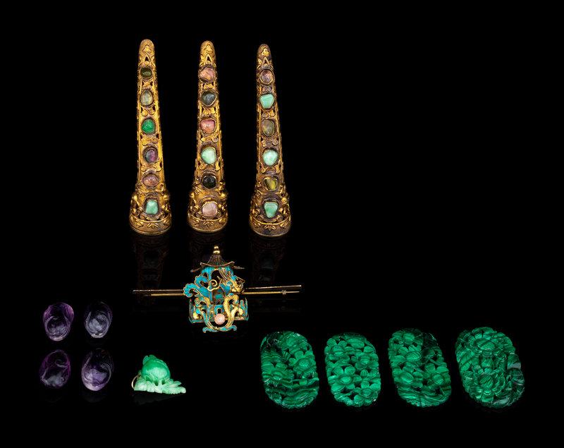 A Group of Chinese Jade, Jadeite, Kingfisher Feather and Hardstone Inlaid Jewelry : A Group of Chinese Jade, Jadeite, Kingfisher Feather and Hardstone Inlaid Jewelry Length of the nail guard 3 1/2 in., 9 cm. This lot is located in Chicago. Size