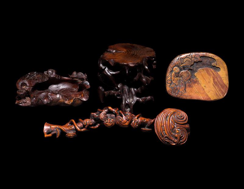 Four Chinese Scholar's Objects: Four Chinese Scholar's Objects the first a 'lotus' brush washer, the second a hardwood stand, the third an inkstone, the fourth a ruyi scepter. Length of longest 13 1/2 in., 34.3