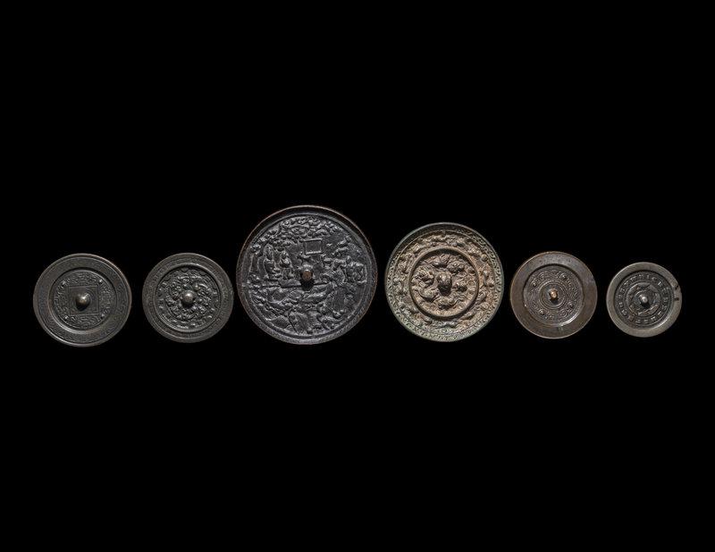 Six Chinese Bronze Mirrors: Six Chinese Bronze Mirrors Diameter of largest: 6 1/4 in., 16 cm. Property from the José M. Neistein Collection Size Diameter of largest: 6 1/4 in., 16 cm.