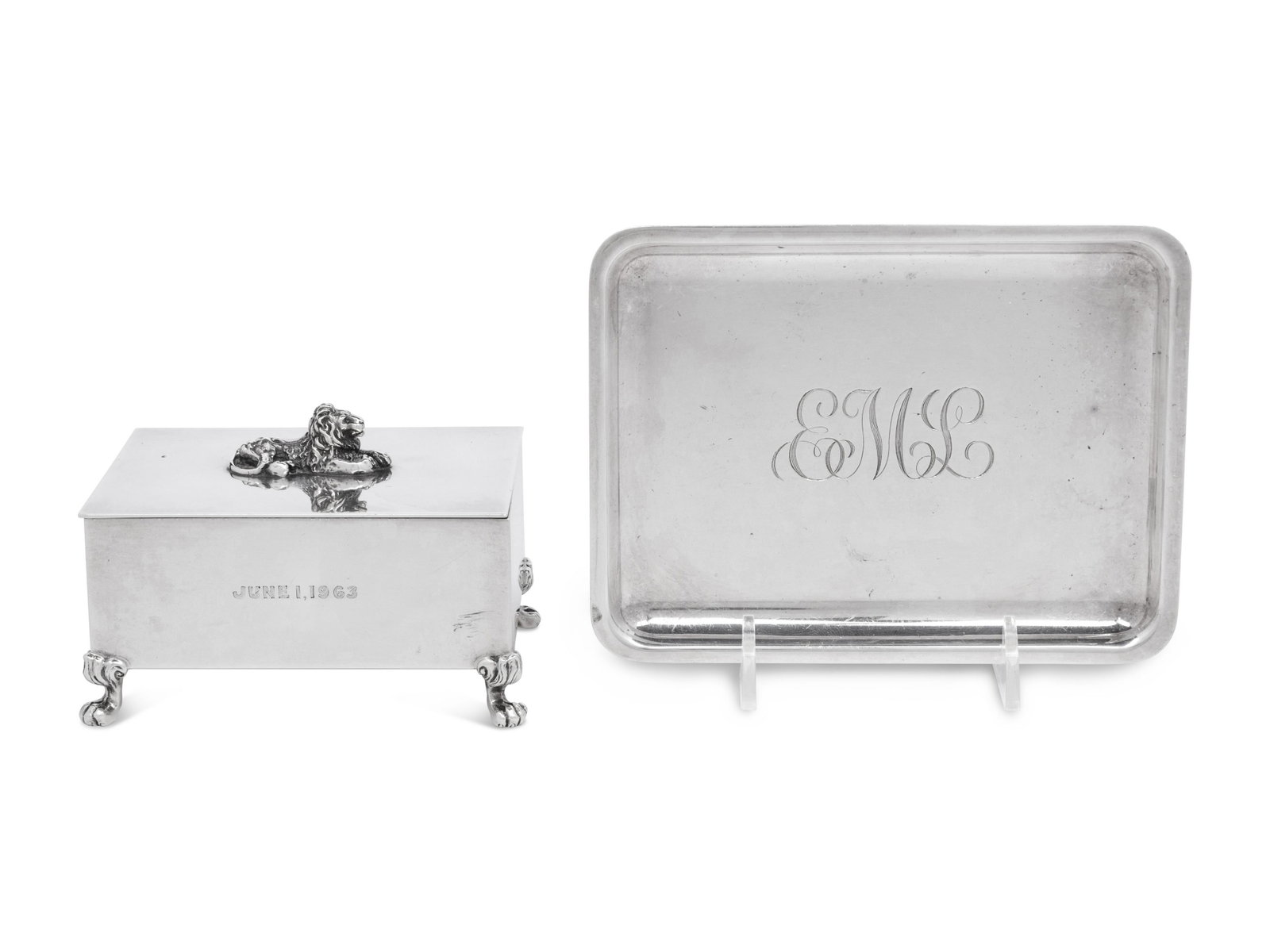 A Tiffany and Co. Casket together with a Tiffany and Co. Dish: A Tiffany and Co. Casket together with a Tiffany and Co. Dish 20th Century with the casket having a velvet lining, with claw feet and a lion form finial. Marked Tiffany & Co. / Makers / Sterling Silve