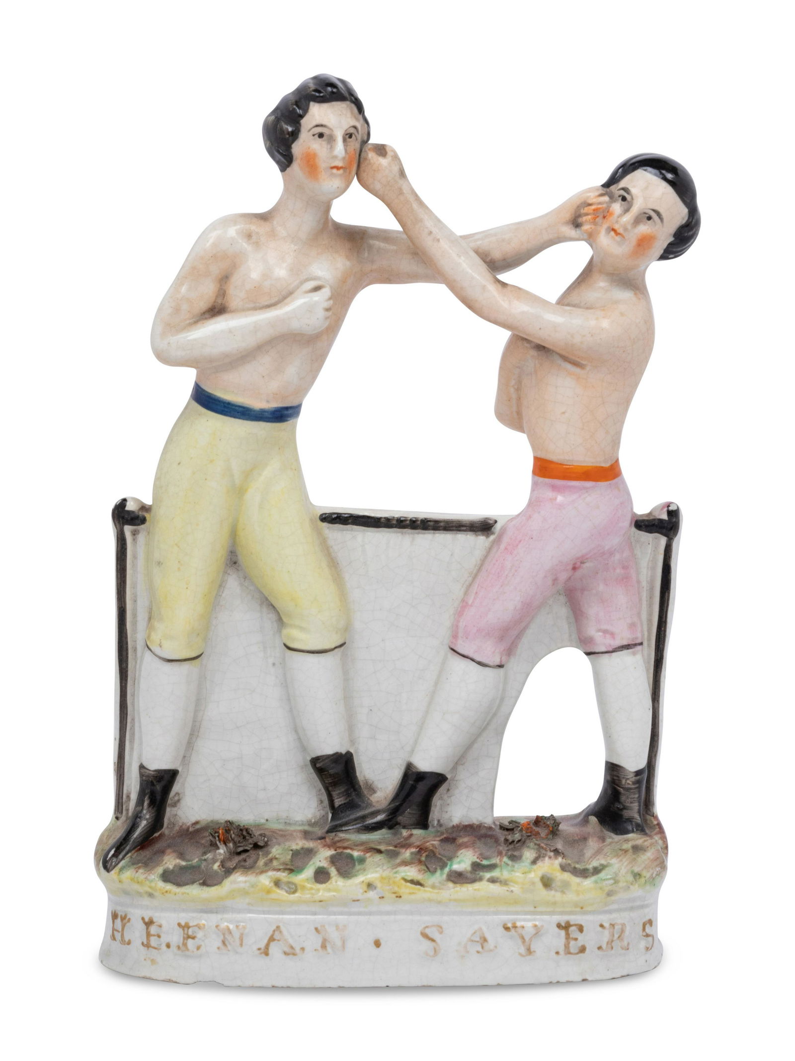 A Staffordshire Earthenware Figural Group: A Staffordshire Earthenware Figural Group 19th Century depicting the pugilists Heenan and Sayers. Height 9 1/2 inches. This lot is located in Chicago.