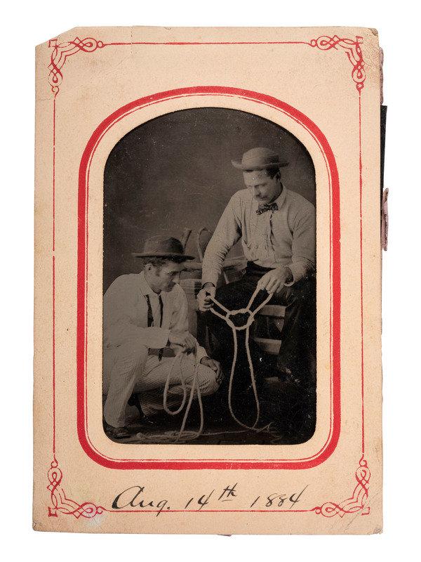 [EARLY PHOTOGRAPHY - TINTYPE]. A pair of tintypes featuring subjects in western dress, comprising:: [EARLY PHOTOGRAPHY - TINTYPE]. A pair of tintypes featuring subjects in western dress, comprising: 2 3/4 x 3 7/8 in. tintype portrait of two men wearing vaguely western-style clothing and making knots