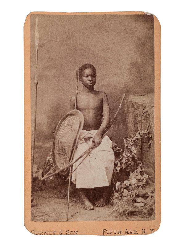 [EARLY PHOTOGRAPHY - AFRICAN]. A group of 4 CDVs featuring African subjects, including:: [EARLY PHOTOGRAPHY - AFRICAN]. A group of 4 CDVs featuring African subjects, including: A pair of views of Saint-Louis, Senegal, showing a multitude of people on the near side of the Senegal River, an