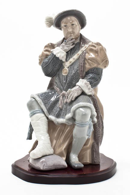 A Lladro Porcelain Figure, Height 12 1/2 inches.: A Lladro Porcelain Figure, Henry VIII, issued in 1978, depicted in a seated pose resting his foot on a pillow, signed by the sculptor Salvador Furio and the painter J. Ruiz, edition 112/1,200, further