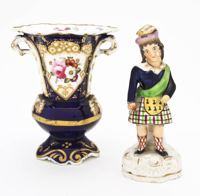 A Staffordshire Figure, Height of first 5 7/8 inc: A Staffordshire Figure, depicting a Scotsman, together with a Rockingham vase. Height of first 5 7/8 inches. Property from the Estate of Jean Ross, Lake Forest, Illinois