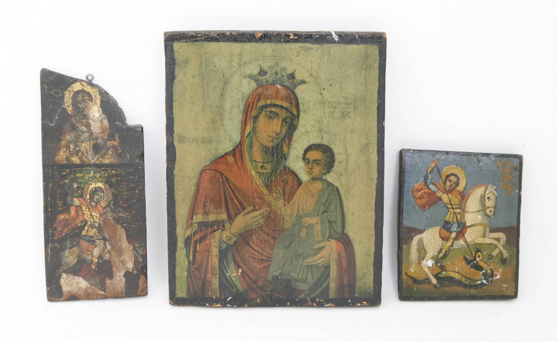 A Collection of Three Eastern European Icons, Hei: A Collection of Three Eastern European Icons, the first depicting the Madonna and Child, the second St. George slaying the Dragon and the third a fragment. Height of first 10 3/4 inches.