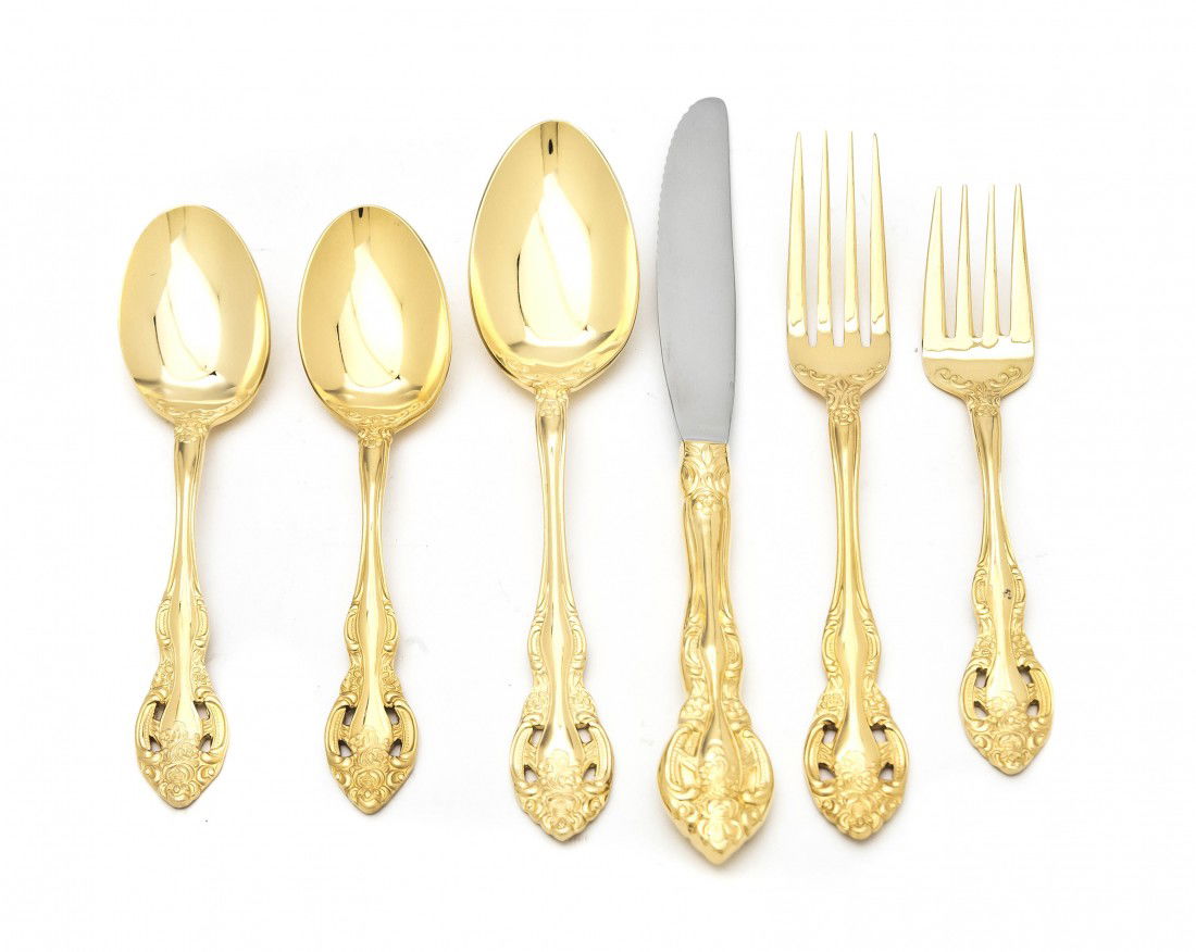 A Set of American Gilt Wash Flatware for Eight, S: A Set of American Gilt Wash Flatware for Eight, Supreme Cutlery Company, comprising dinner knives, dinner forks, teaspoons, tablespoons and salad forks. Length of first 8 3/4 inches. Property from the