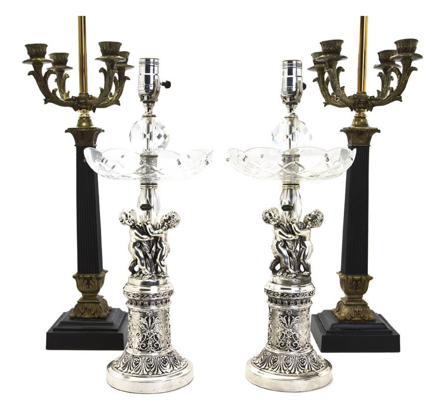 Two Pairs of Table Lamps, Height of taller overal: Two Pairs of Table Lamps, comprising one pair with molded glass and putto stem and a pair of columnar form. Height of taller overall 31 inches. Property from the Leon Brown Trust, U.S. Bank, Trustee, 