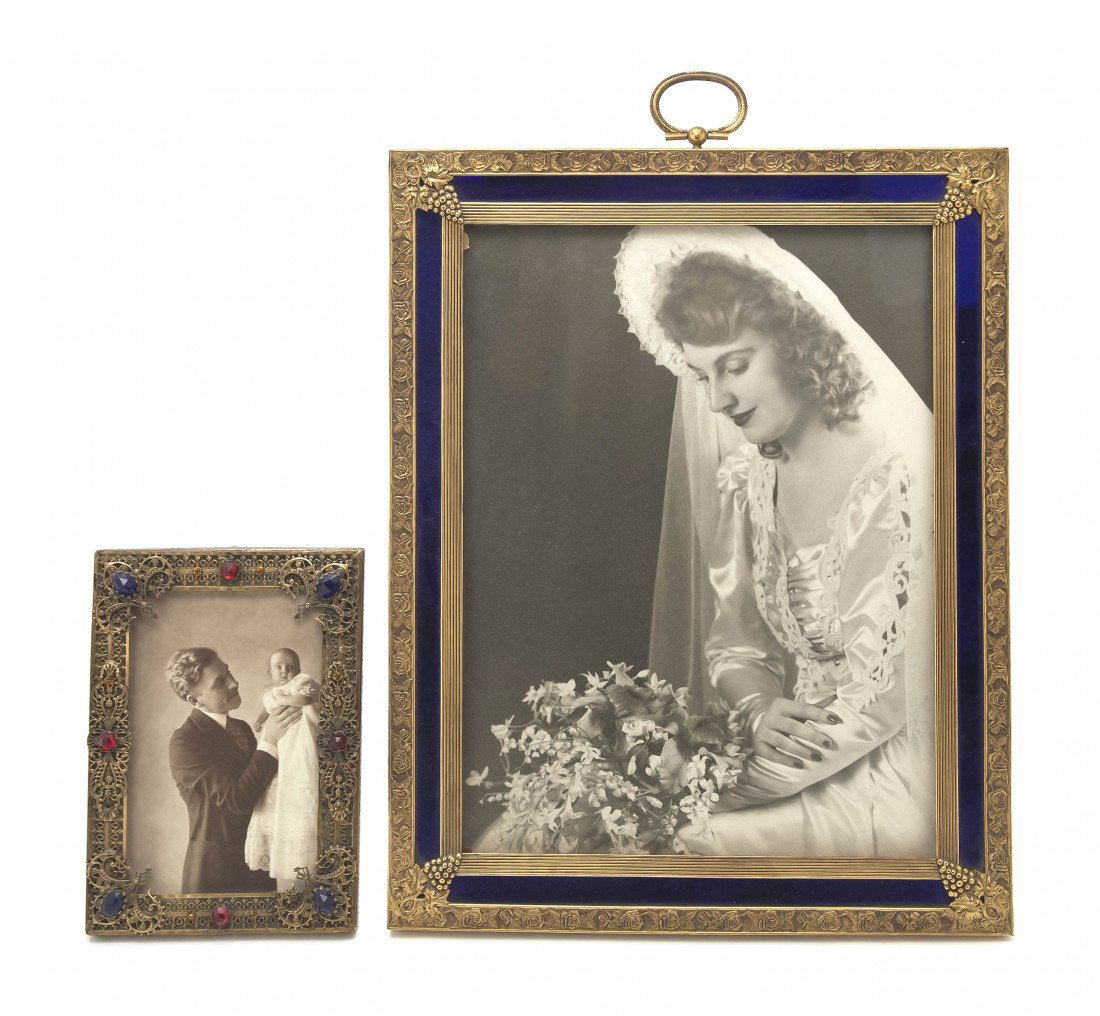 A Brass and Enameled Picture Frame, Height of fir: A Brass and Enameled Picture Frame, of rectangular form with grapevine decoration, together with a jeweled example. Height of first 14 1/2 inches. Property from the Leon Brown Trust, U.S. Bank, Truste